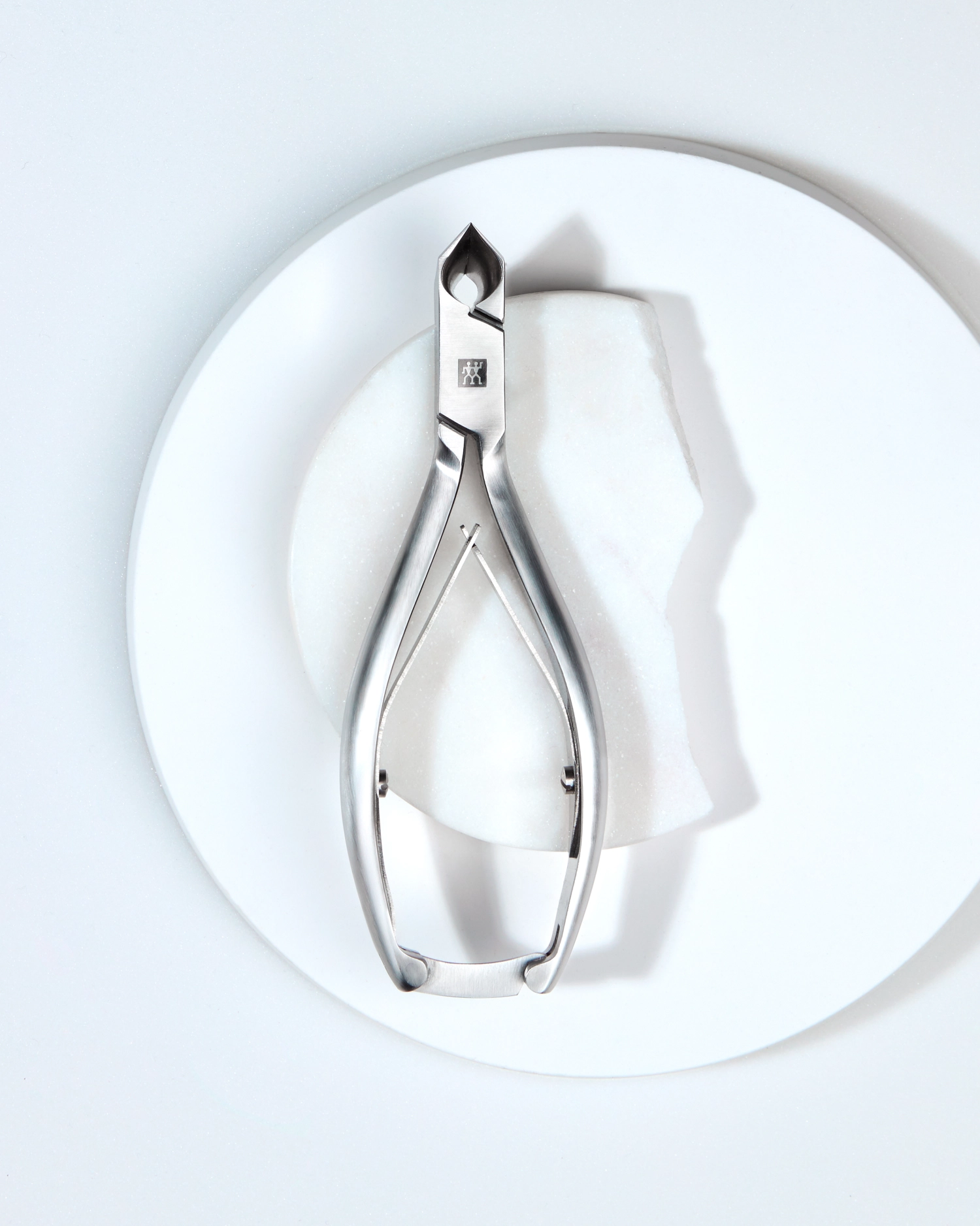 Pince à ongles coupe-tête